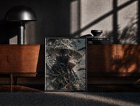 Black-framed anime ninja with red eyes print on a moody console with designer coffee-table books