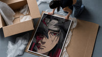 Anime ninja with red Sharingan eye framed print being unpacked from protective bubble wrap and a box