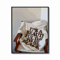 Framed It's a Beautiful Day to Be Black print shown as a bold statement piece on a clean gallery wall