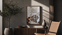 It's a Beautiful Day to Be Black poster framed above a fluted sideboard beside a potted tree