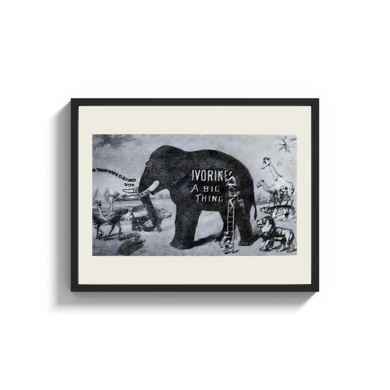 Framed Large elephant with tusks print shown as a wide statement piece on a clean white wall