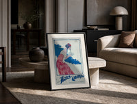 Woman holding soap box print in a black frame leaning on a travertine table in a sunlit lounge