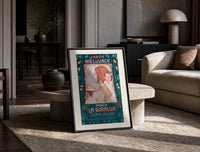 Art Nouveau woman in profile print in a black frame leaning on a travertine table in a sunlit lounge