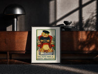 Black-framed Pumpkin-headed man driving red car print on a moody console with designer coffee-table books