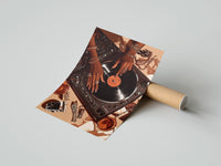 Gently curled Jeweled Hands on a Record Player print beside its protective shipping tube