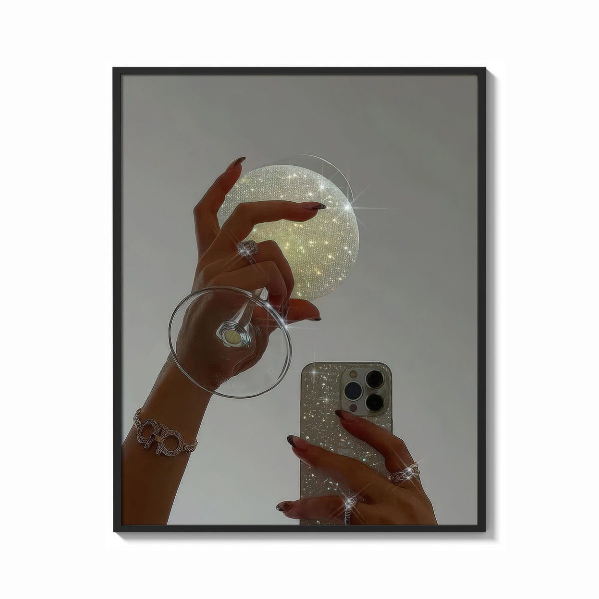 Framed Jeweled Hands with Phone and Glass print shown as a bold statement piece on a clean gallery wall