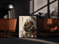 Black-framed White-haired ninja sitting thoughtfully print on a moody console with designer coffee-table books
