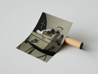 Moody editorial sneaker print showing a Jordan 1 atop stacked Nike boxes beside a kraft mailing tube