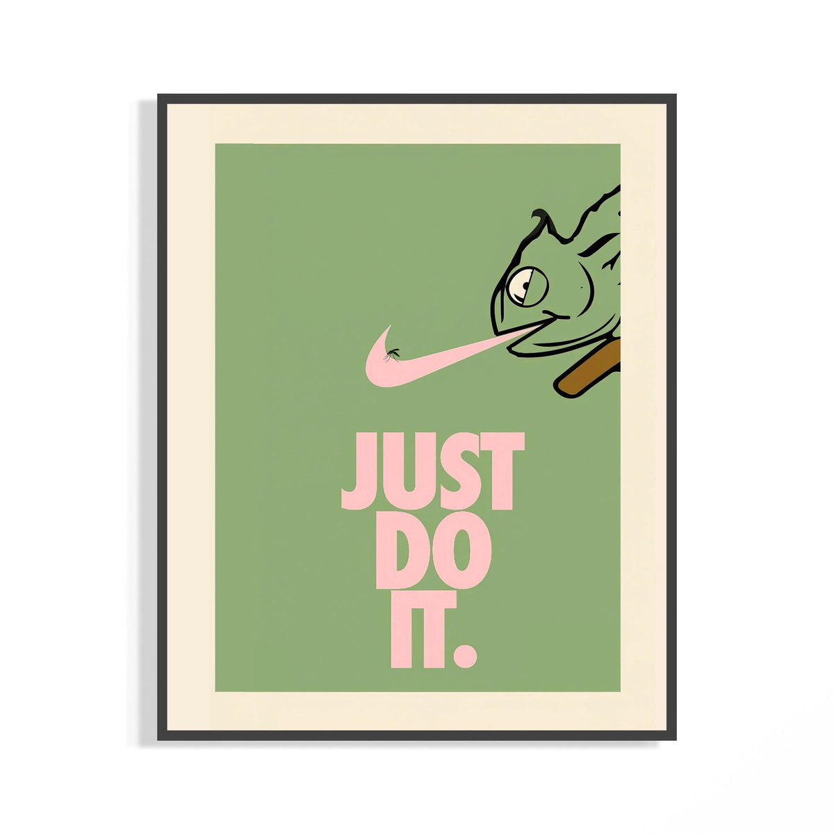 Framed chameleon poster in black frame, pink Nike swoosh over sage green with Just Do It text