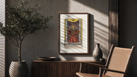 Justice tarot card figure poster framed above a fluted sideboard beside an olive tree