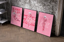 KAWS BFF figure trio set of three black-framed prints leaning against a raw-plaster wall