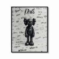 Framed Black and white KAWS graffiti framed poster print shown as a bold statement piece on a clean gallery wall