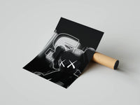 Close-up of XXL KAWS typography detail in holographic neon on a blackout Monolith Shadow poster