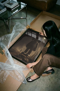 The Giant KAWS Companion figure looming over small human poster shown across its range of print sizes