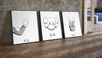 KAWS cartoon hands and skull face three-piece set leaning on parquet beside a vintage loft door