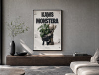 KAWS Companion figure holding monstera plant poster framed above a wood console in a concrete-wall living room
