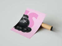 KAWS figure head with white X eyes resting on bold pink typography over a pastel background