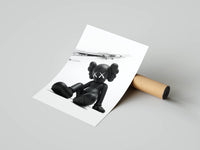 Three-panel KAWS x Nike gallery wall with sleek all-black designs for a modern hypebeast room