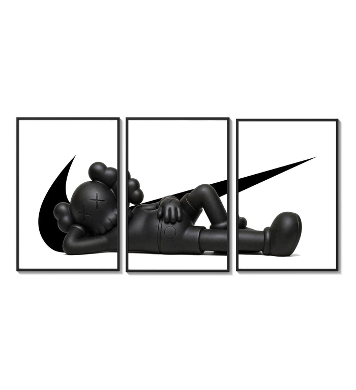 Black stylized figure lying down with crossed eyes three-panel set arranged on a gallery wall
