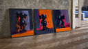 KAWS Companion figures triptych three-piece set leaning on parquet beside a vintage loft door