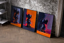 KAWS Companion figures triptych set of three black-framed prints leaning against a raw-plaster wall