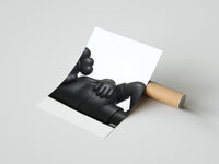 KAWS Companion Black Monochrome Set of 3 poster rolled beside its crush-resistant shipping tube