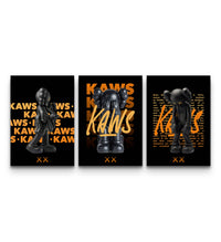 Three KAWS orange edition prints on black showing companion figures and bold orange KAWS typography