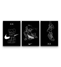 KAWS x Nike Retro Sketch triptych poster set arranged together with white line art prints on black backdrops