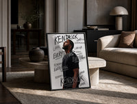 Man looking upward in profile print in a black frame leaning on a travertine table in a sunlit lounge