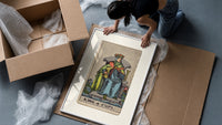 King of Cups tarot figure framed print being unpacked from protective bubble wrap and a box