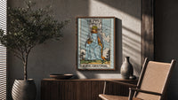 King of Swords poster framed above a fluted sideboard beside a potted tree