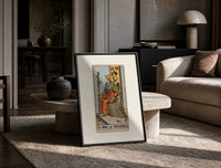 King seated on throne with staff print in a black frame leaning on a travertine table in a sunlit lounge