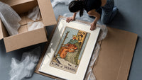 King seated on throne with staff framed print being unpacked from protective bubble wrap and a box