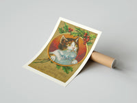 Gently curled Kitten Wishing You a Merry Christmas print beside its protective shipping tube