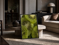 Kiwi Fruit Slices print on the floor, leaning against a travertine table