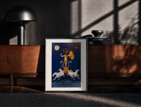 Black-framed Rooster-headed Abraxas deity on chariot print on a moody console with designer coffee-table books