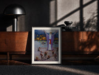 Black-framed Robed magician invoking spirits print on a moody console with designer coffee-table books