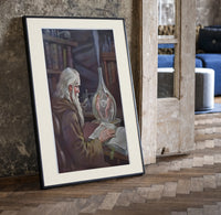 Old alchemist reading book with flask print in a black frame leaning beside a vintage door on parquet
