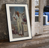Ancient Greek philosopher holding pyramid print in a black frame leaning beside a vintage door on parquet