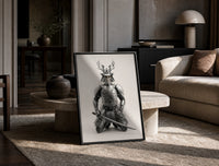 Skeletal samurai in metallic armor print in a black frame leaning on a travertine table in a sunlit lounge