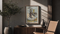 Knight of Cups poster framed above a fluted sideboard beside a potted tree