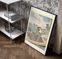 Japanese woman in striped kimono on boat poster in a black frame leaning beside a shelf in a raw-plaster loft