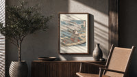 Japanese woman in striped kimono on boat poster framed above a fluted sideboard beside an olive tree