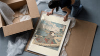 Japanese woman in striped kimono on boat framed print being unpacked from protective bubble wrap and a box