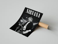 Kurt Cobain Nirvana Live poster print laid beside its crush-resistant shipping tube
