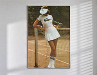 Lacoste vintage tennis poster in a slim frame on a bright wall with soft window light