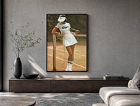 Lacoste vintage tennis poster framed above a wood console in a concrete-wall living room