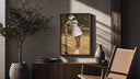 Lacoste vintage tennis poster framed above a fluted sideboard beside an olive tree