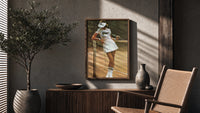 Lacoste vintage tennis poster framed above a fluted sideboard beside an olive tree