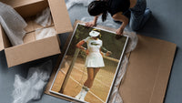 Lacoste vintage tennis framed print being unpacked from protective bubble wrap and a box